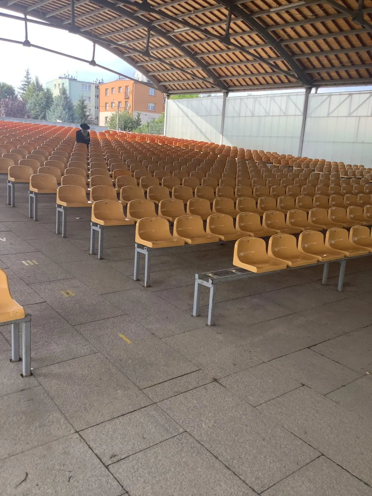 The rows of seating in the Opatów amphitheater; the kever is beneath the seats: Row 5, Seat 6.